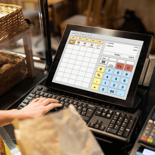 Price Calculation in POS Systems: Common Issues & Fixes 1 POS system screen being used at a retail counter.