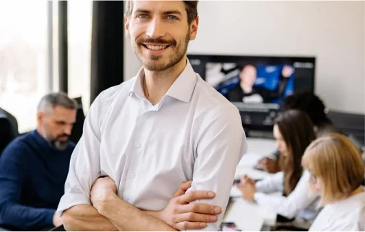 A Man Standing In An Office 7792811 1